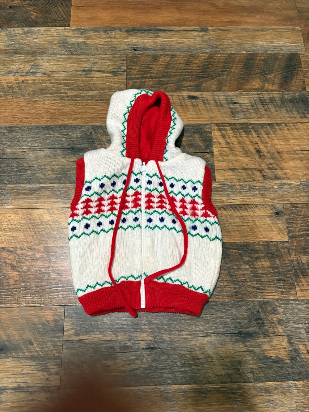 vintage kid's knit sweater vest featuring a festive, Fair Isle holiday pattern